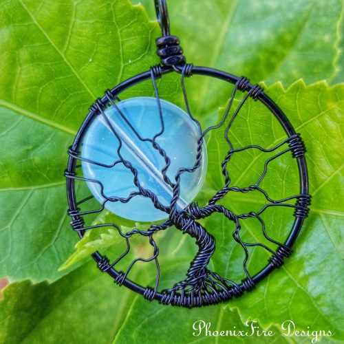 Opalite Moonstone Full Moon Tree of Life Pendant hand wire wrapped in black wire by PhoenxiFire Designs. Handmade wire wrapped necklace, celtic full moon tree, tree jewelry, gift for her on etsy.